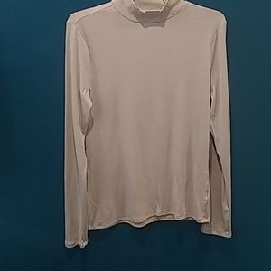 A light cream size large 12-13 girls long sleeves